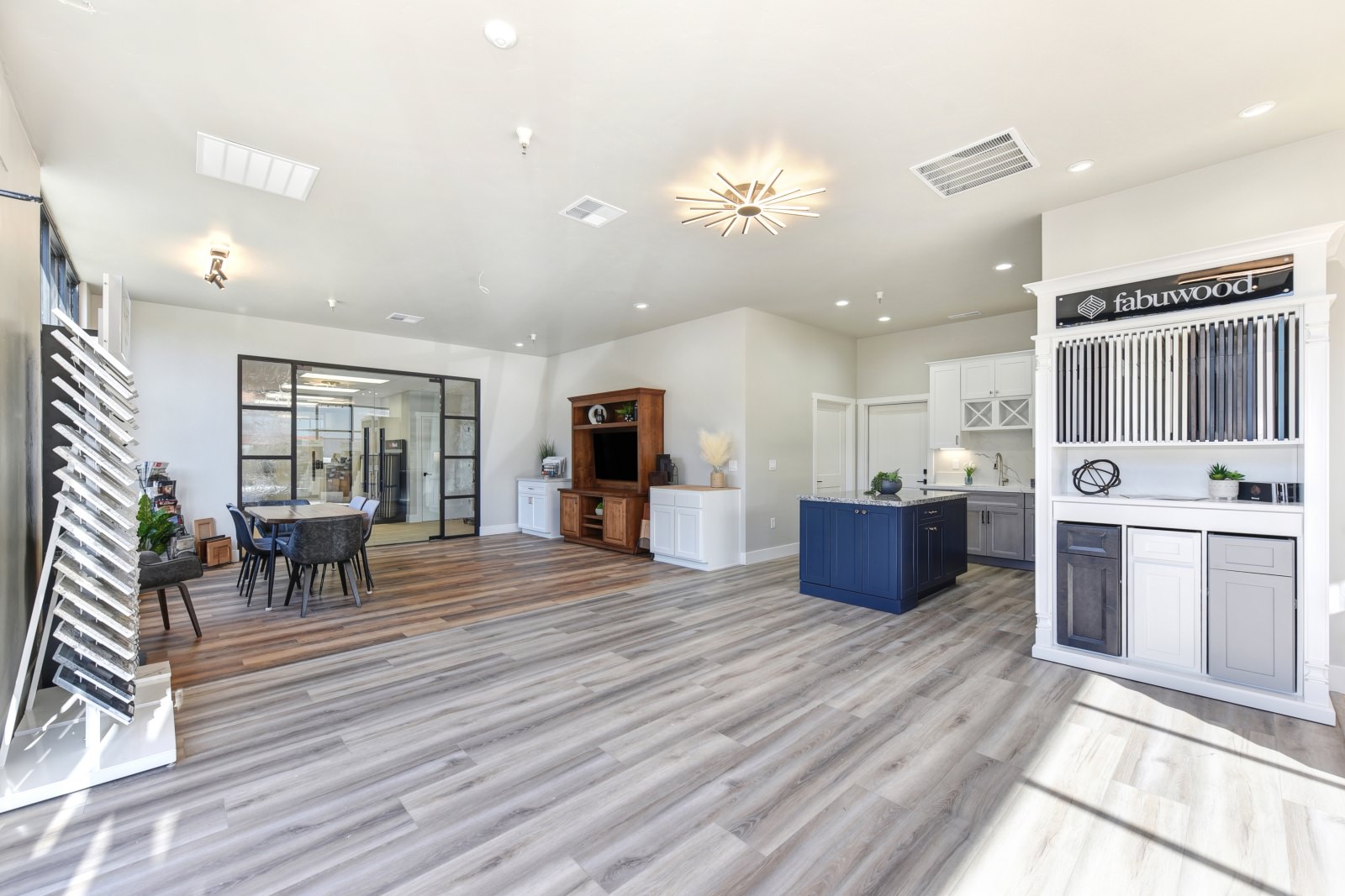 Dry Creek Construction showroom with a table set up - lightbox