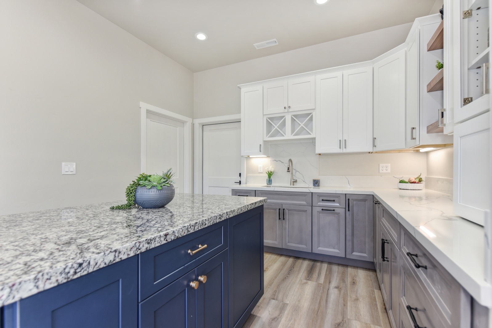 Dry Creek Construction showroom of cabinets and kitchen counter - lightbox